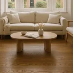 Wood flooring offers diverse tones, natural grain patterns, and finish options, so it complements various interiors. With different styles available, homeowners can select options that add warmth and character to heritage properties or reinforce clean lines in contemporary rooms. Here are a few wood floor styles to enhance your home's aesthetic: Wide-Plank Modern Minimalist  Wide-plank flooring can enhance your interior's aesthetics by creating a quiet architectural foundation. This style has a low-sheen finish, clean lines, and subtle color variation. It also features wide hardwood boards; this helps create an open visual effect that complements modern minimalist aesthetics.  Fewer seams between the wide planks keep the wood's natural grain and character more visually continuous across the floor. The boards' long edges also help guide the eye through the room, and they create a more continuous visual direction. When you orient this wood flooring style toward a hallway or major architectural feature, it can reinforce your home's visual flow. It also helps make the layout feel more intentional. Elegant Linear Grain Linear grain flooring features straight, elongated grain lines that follow the length of each plank. Unlike flooring with pronounced cathedral patterns, the grain stays more consistent across individual boards. This can make the flooring look more uniform, but it still preserves the natural variation found in real wood. Subtle differences in grain and tone keep the surface from looking completely uniform. The linear pattern can complement interiors with clean lines and simple architectural details. Light Maple Hardwood Light maple hardwood offers a clean and understated aesthetic that suits modern and contemporary interior spaces where simplicity and precision matter. This flooring features a pale cream-to-light-honey color and a tight, relatively uniform grain. The combination creates a clean visual base; its neutral look works with diverse interior styles. The fine, straight grain on maple hardwood creates a more uniform surface than flooring with pronounced knots or varied patterns. The wood's pale color can also make differences between adjoining planks less noticeable, so there's greater consistency across the floor. When used throughout adjoining rooms, light maple helps maintain a cohesive appearance without strong color or grain variation. It can also brighten interior spaces with limited natural light, making it practical for urban residences and compact layouts.  Scandinavian Pale Blonde Scandinavian flooring typically uses pale blonde tones, low color variation, and matte finishes. These characteristics create a light, understated appearance without relying on high-contrast grain or glossy surfaces. The pale-warm neutral color adds brightness, but it avoids the strong yellow or orange cast associated with ambered finishes. Pairing pale wood floors with light walls and restrained furnishings can maintain a consistent color palette throughout the space. Install Wood Flooring Today The right flooring style helps create the desired interior aesthetic by balancing color variation, grain, and tone. Additional styles, such as dark-toned hardwoods or hickory, offer deeper tones and more pronounced natural grain variation. Different wood species also vary in durability and hardness, so the right option depends on how you'll use the space. Contact a reputable hardwood flooring expert today to explore styles that complement your home's interior design.